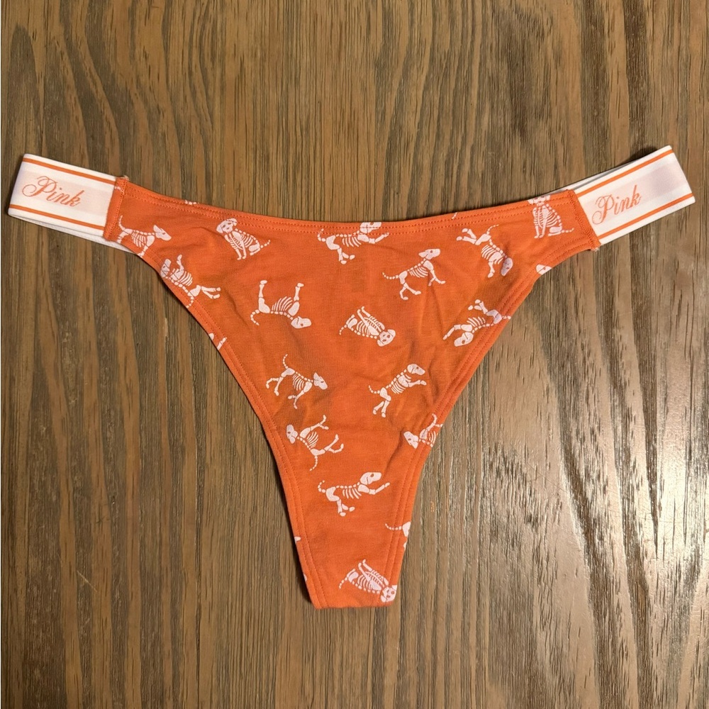 NWT Victoria’s Secret PINK Orange Skeleton Dog Halloween Logo Thong Panty M